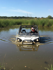 Load image into Gallery viewer, Can Am Commander 800/1000 snorkel kit by Going Deep Snorkels installed on the vehicle, featuring high-clearance snorkel tubes for water crossings.